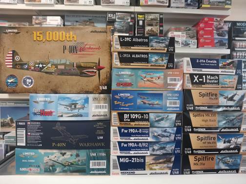 A display of model airplanes on a shelf

AI-generated content may be incorrect.